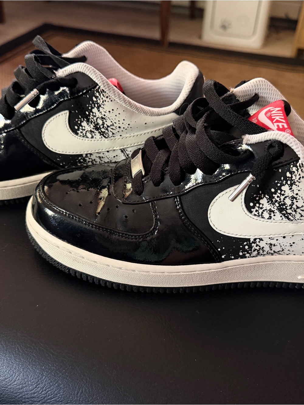 Nike Black Patent Low-Top Sneakers with White Splash Swoosh